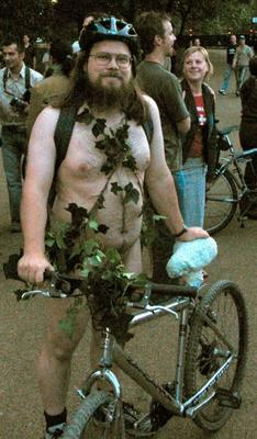A happy rider on his first nude ride ever.  He gave his permission to allow this photo to appear on the site, but not for use at other sites or print media.